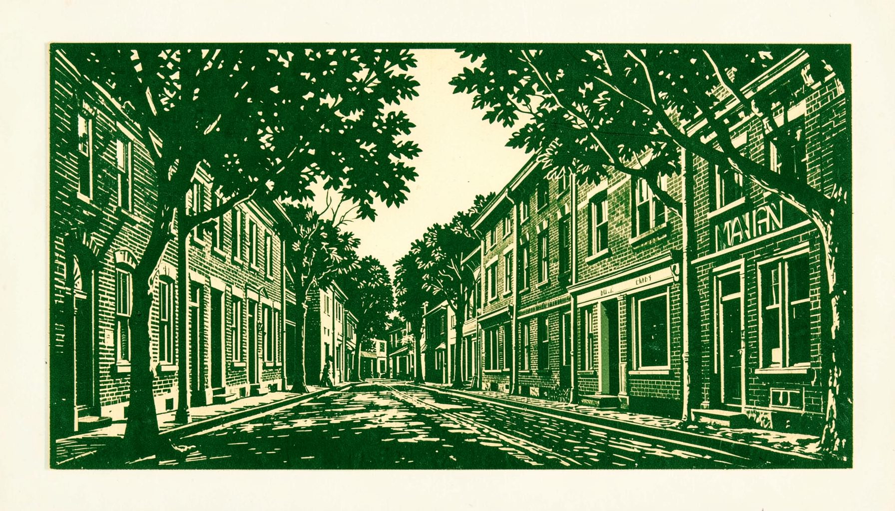 Carved linocut relief print of a quiet Main Street scene with historic brick buildings and leafy trees, rendered in deep greens and warm browns.